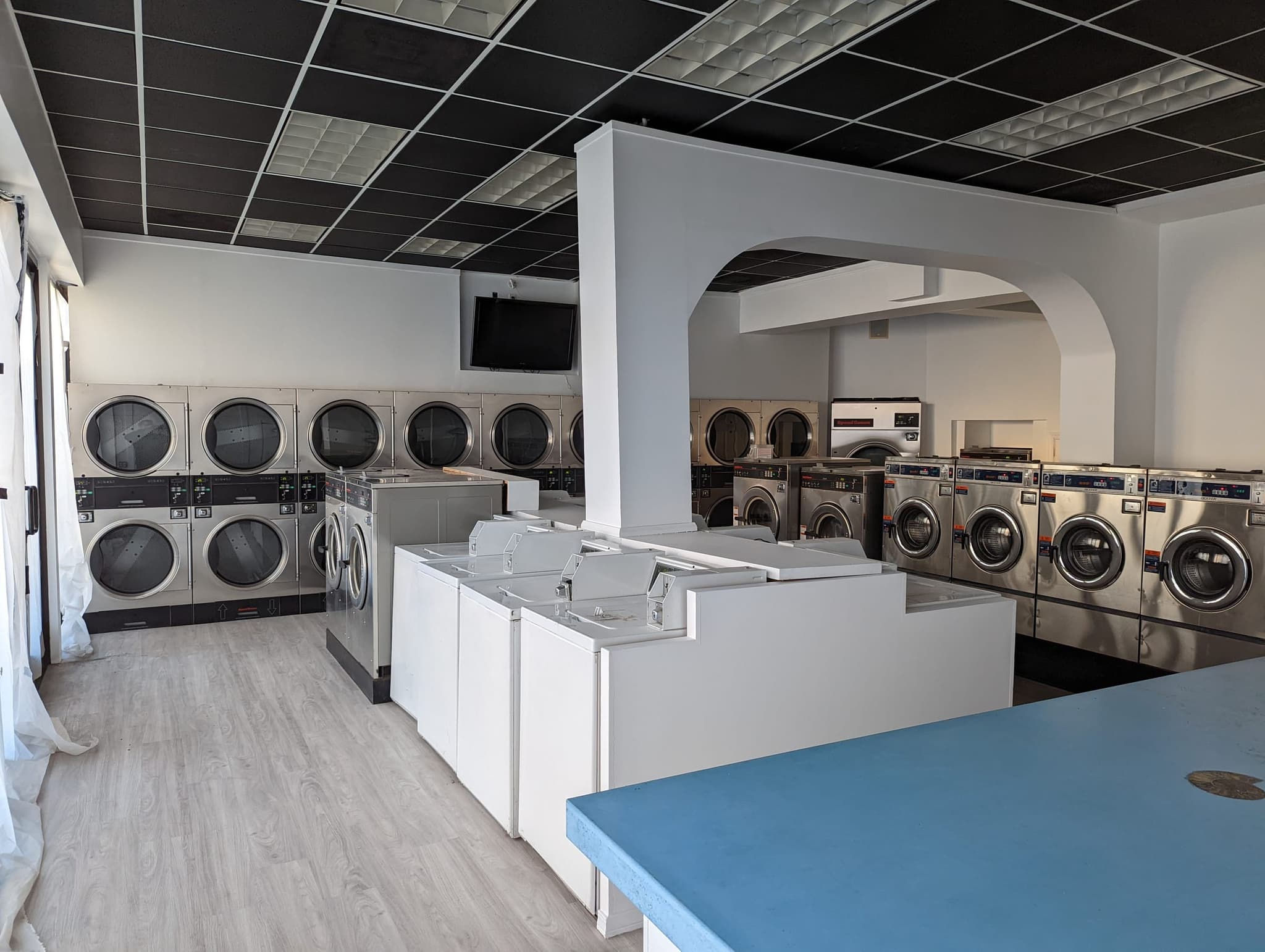 El Porto Laundry interior overview before opening with machines installed